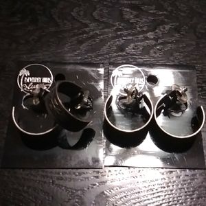 Metal post earrings with Mayan like symbols on outside of hoops